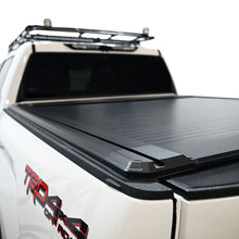 Load image into Gallery viewer, Westin Manual Retractable Tonneau Cover 22-26 Toyota Tundra 5.5ft Bed Black