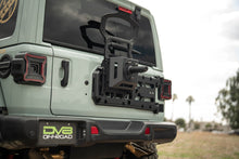 Load image into Gallery viewer, DV8 Offroad 18-25 Jeep Wrangler JL Spare Tire Carrier