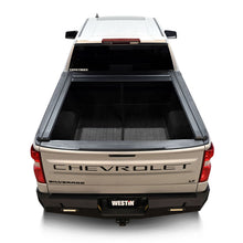 Load image into Gallery viewer, Westin 19-26 GM Silverado/Sierra 1500 5ft 8in Bed Manual Retractable Tonneau Cover - Black
