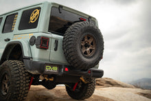 Load image into Gallery viewer, DV8 Offroad 18-25 Jeep Wrangler JL Spare Tire Carrier
