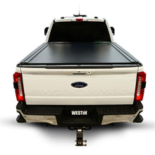 Load image into Gallery viewer, Westin 17-26 Ford F-250/F-350/F-450/F-550 SD 6ft 10in Bed Manual Retractable Tonneau Cover - Black
